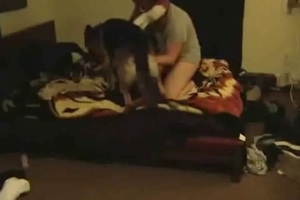 Dog fucked on cam by a dude in mask